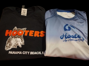 Secondary image for the Hooter's PCB, $50 Gift Card and XL Black T-shirt as well as a Medium UPF 50 shirt, Value $94 Auction Item