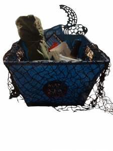 Primary image for the 1 year Family Membership to Man in the Sea Museum PCB. Includes 3 tshirts, Jalapeno sauce, keychain, metal sea turtle in a blue basket. Value $120 Auction Item
